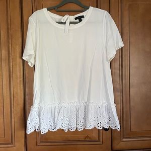 White cotton J Crew top with lace eyelet detail.